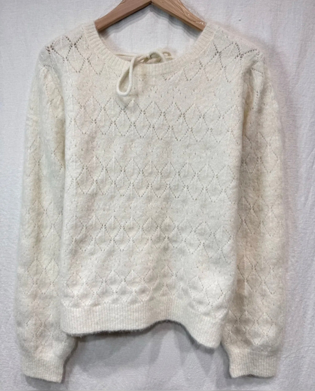 Pull maille dos ouvert
