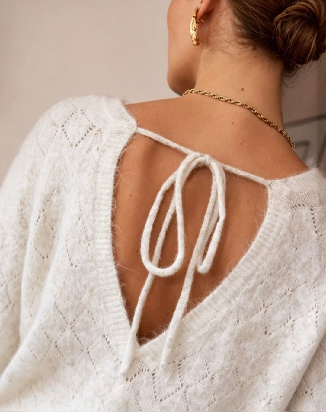 Pull maille dos ouvert
