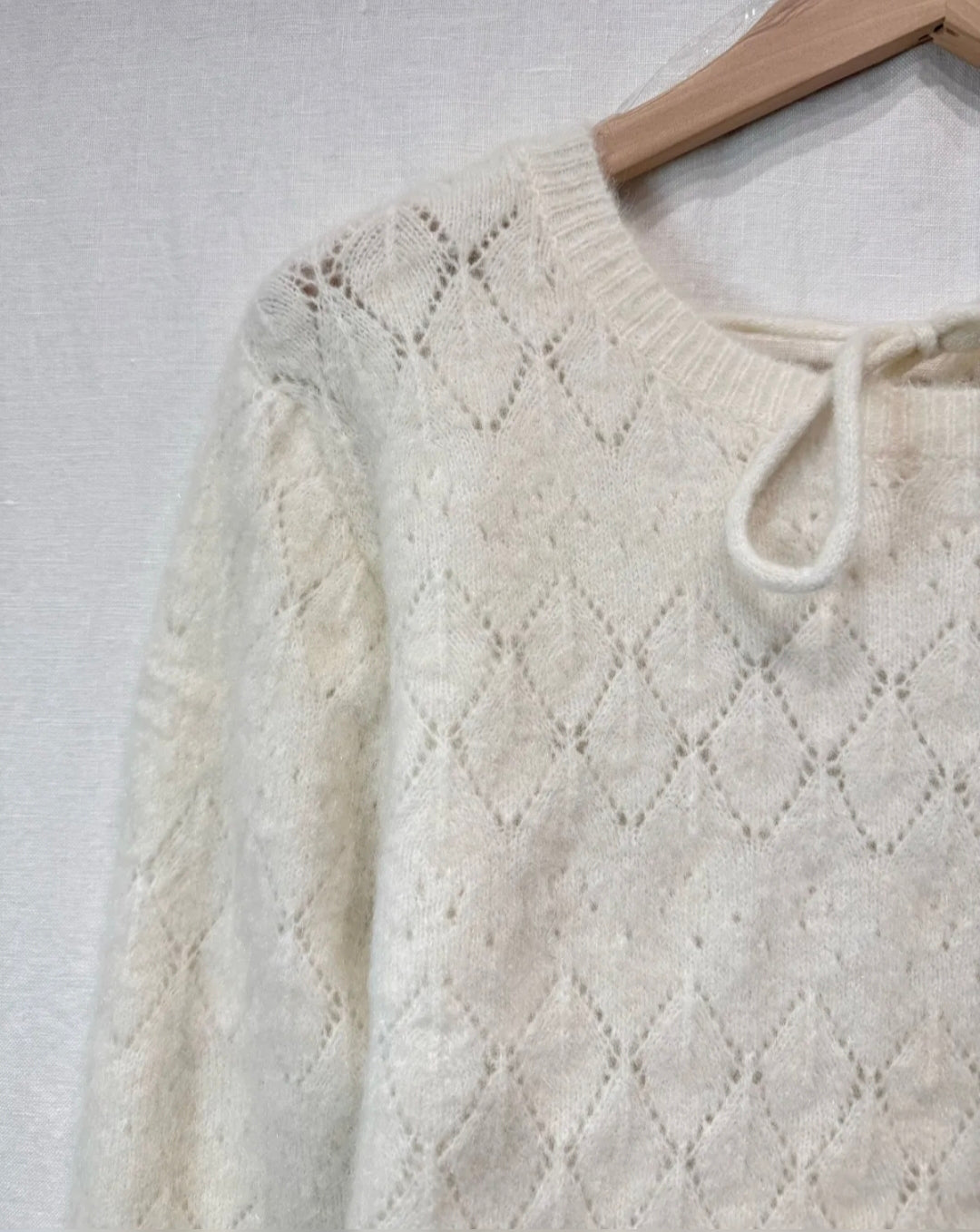 Pull maille dos ouvert